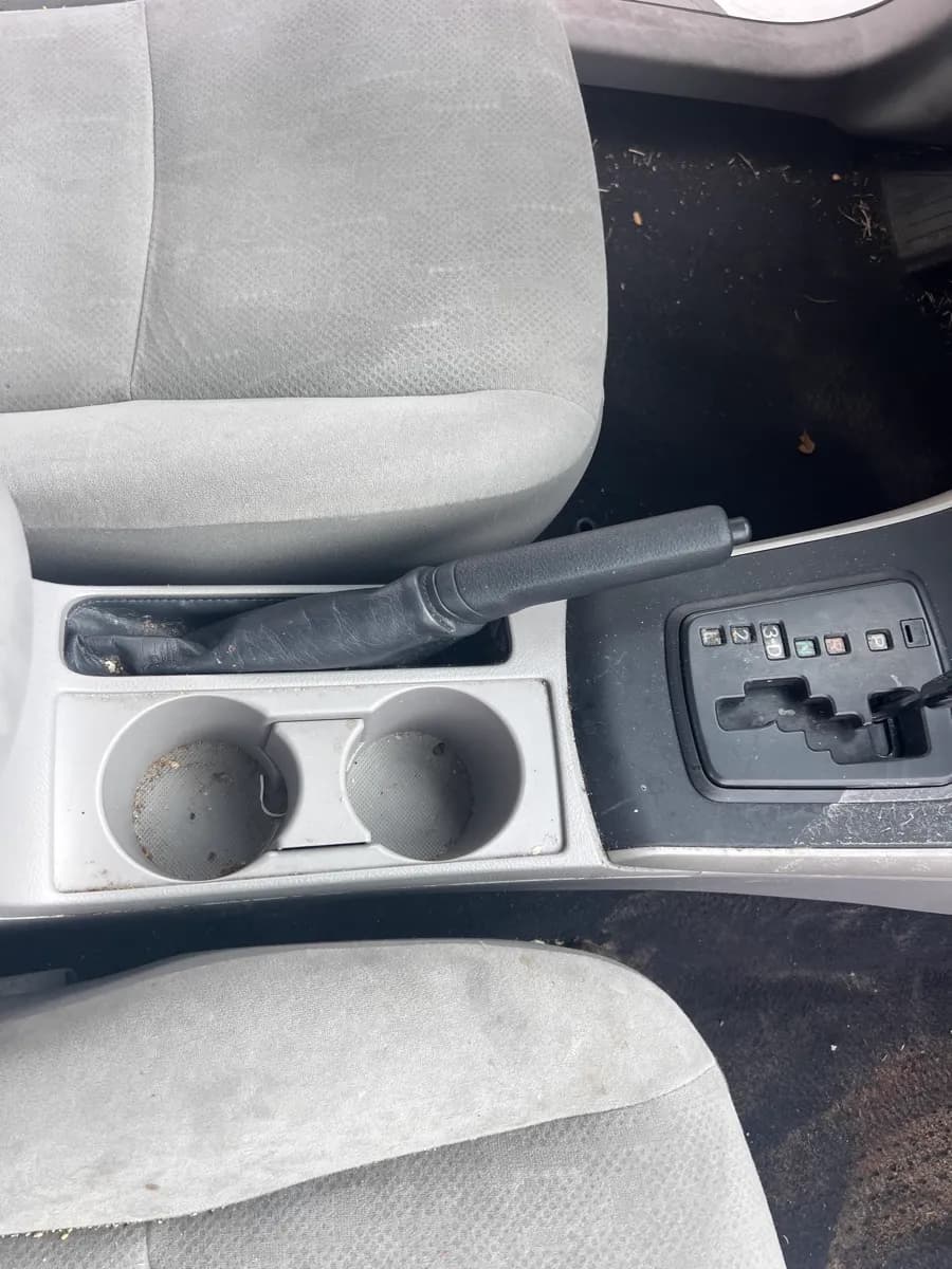Center console and cup holders — before