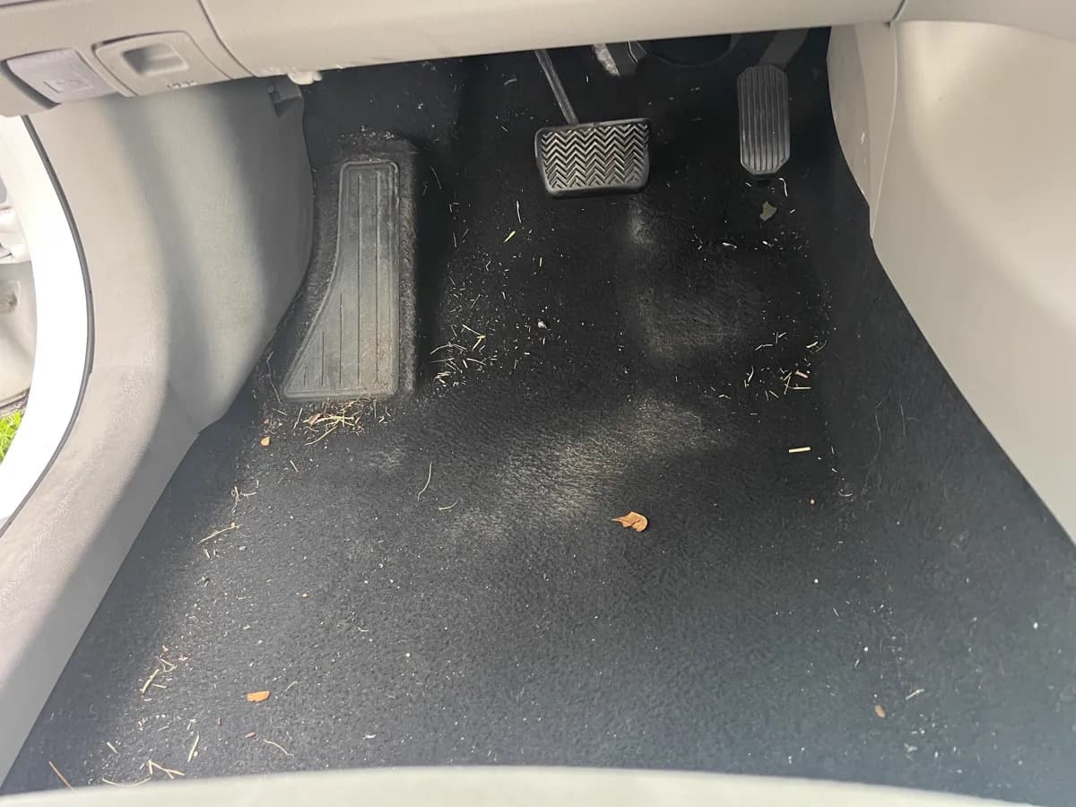 Driver footwell and pedals — before